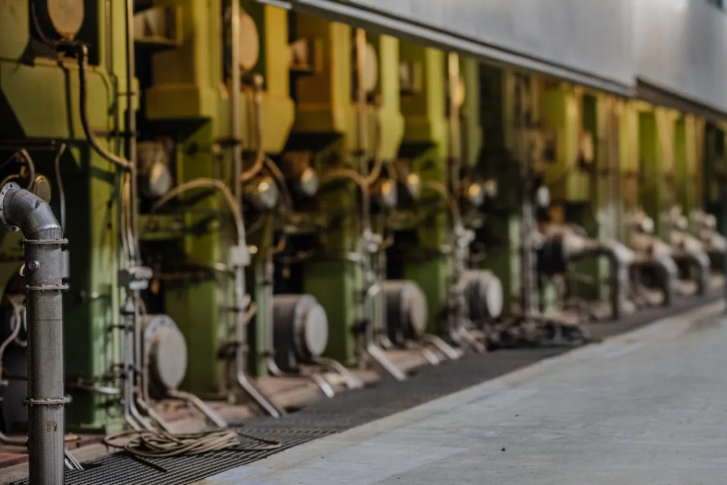 Pipes and pumps along the paper production line